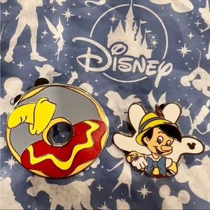 Lot of 2 Disney Pins: Dumbo Donut and Pinnochio Hidden Mickey